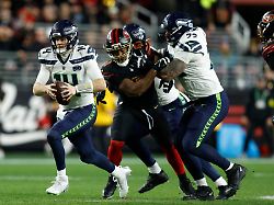 jan 3 2026 santa clara california usa seattle seahawks quarterback sam darnold 14 rushes the ball against the san francisco 49ers during the first half at levi s stadium