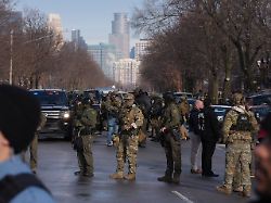 law enforcement agents stand on the scene of a shooting at east 34th street and portland avenue in minneapolis on jan 7 2026 alex kormann the minnesota star tribune tns abacapress