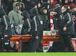 liverpool s conor bradley is taken off the pitch during the english premier league soccer match between arsenal and liverpool in london thursday jan 8 2026