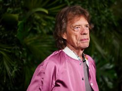 mick jagger arrives at chanel s 16th annual pre oscar awards dinner on saturday march 1 2025 at the beverly hills hotel in beverly hills calif