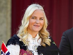 norway s crown princess mette marit watches a parade on the occasion of norway s constitution day at skaugum their official residence near oslo wednesday may 17 2023