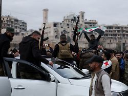people celebrate in sheikh maksoud neighbourhood following the collapse of an agreement between the syrian government and the syrian democratic forces sdf in aleppo syria january 10 2026