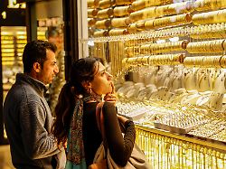 people look at gold jewelleries as they stand outside a jewellery shop at the grand bazaar in istanbul turkey january 26 2026