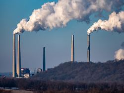 pollution and steam rise from the stacks of the miami fort power station which is situated along the ohio river near cincinnati ohio on january 12 2026