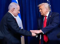 president donald trump shakes hands with israel s prime minister benjamin netanyahu during a news conference at mar a lago monday dec 29 2025 in palm beach fla