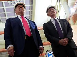 president donald trump speaks as federal reserve chairman jerome powell listens during a visit to the federal reserve thursday july 24 2025 in washington 1