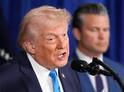 president donald trump speaks at his mar a lago club saturday jan 3 2026 in palm beach fla as defense secretary pete hegseth listens