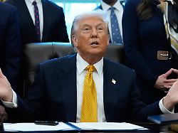 president donald trump speaks in the oval office of the white house wednesday jan 14 2026 in washington before signing a bill that returns whole milk to school cafeterias across the country