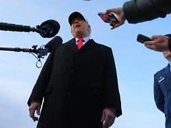 president donald trump speaks with reporters at joint base andrews tuesday jan 13 2026 in joint base andrews md
