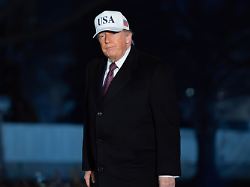 president donald trump talks to reporters as he walks on the south lawn of the white house sunday jan 11 2026 in washington