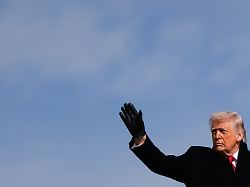 president donald trump waves while boarding air force one friday jan 16 2026 at joint base andrews md