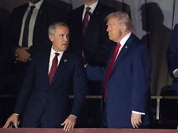 prime minister mark carney speaks with u s president donald trump as they wait for the fifa world cup draw to begin at the kennedy center in washington friday dec 5 2025