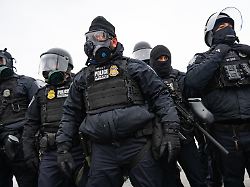 protesters gather in front of the whipple federal building in minneapolis united states on january 15 2026 and get shot with pepperballs pepper spray and flash bangs