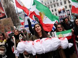 sensitive material this image may offend or disturb a protester holds a mock body bag during a rally in support of nationwide protests in iran in madrid spain january 17 2026