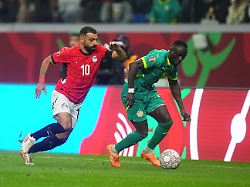 sadio mane of senegal and mohamed salah mahrous ghaly of egypt battle for the ball during the semi final final match between senegal and egypt at tangier stadium tangier morocco on january 14 2026