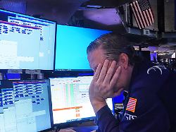specialist gregg maloney works at his post on the floor of the new york stock exchange tuesday jan 20 2026