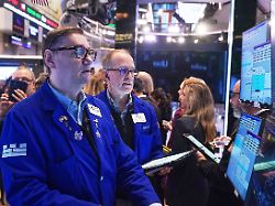 specialist patrick king left and trader mark puetzer work on the floor of the new york stock exchange wednesday jan 28 2026 1
