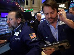 traders work on the floor at the new york stock exchange nyse in new york city u s january 6 2026