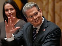 treasury secretary scott bessent waves during a roundtable meeting with president donald trump on farm subsidies in the cabinet room of the white house monday dec 8 2025 in washington