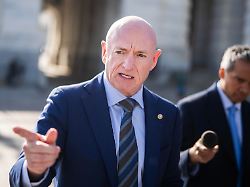 united states january 8 sen mark kelly d ariz talks with reporters after a vote on the war powers resolution outside the u s capitol on thursday january 8 2026
