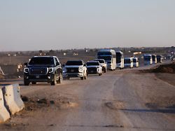 vehicles carrying members of the syrian army head to al hasakah following the withdrawal of the syrian democratic forces syria january 20 2026