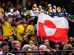 260214 a flag of greenland in the stands during the men s ice hockey game between usa and denmark during day 8 of the 2026 winter olympics on february 14 2026 in milan