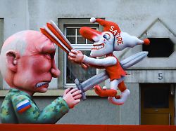 a carnival float depicting russian president vladimir putin stands at the traditional rosenmontag rose monday carnival parade in duesseldorf germany february 16 2026