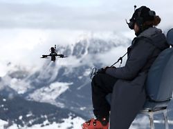 a drone operator captures video ahead of an alpine ski men s super g race at the 2026 winter olympics in bormio italy wednesday feb 11 2026 2
