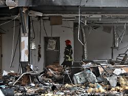 a firefighter works at a car dealership damaged by a russian drone attack odesa ukraine february 13 2026 energy facilities as well as port and civilian infrastructure were targeted by russian uavs