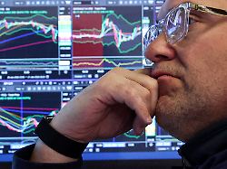 a specialist trader works at his post on the floor at the new york stock exchange nyse in new york city u s january 21 2026