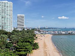 beach and blue sea with buildings resort and blue sky nature and summer concept