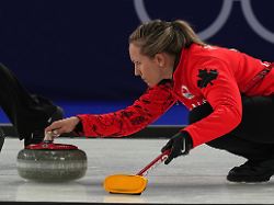 canada s rachel homan in action during the women s curling round robin session against switzerland at the 2026 winter olympics in cortina d ampezzo italy saturday feb 14 2026