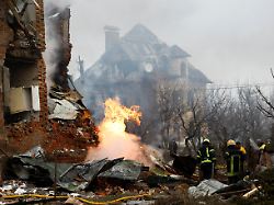 firefighters work at the site of a residential building damaged during russian drone and missile strikes amid russia s attack on ukraine in kyiv ukraine february 22 2026