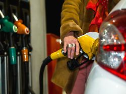 france montauban 2022 03 07 a woman fills up with diesel fuel increase in fuel prices in france night photography in gas stations photography by patricia huchot boissier abacapress com
