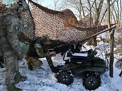 in this photo provided by ukraine s 65th mechanized brigade press service soldiers test land drones in zaporizhzhia region ukraine monday jan 26 2026