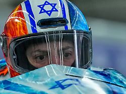 israel s adam edelman front and menachem chen start for a two man bobsled run at the 2026 winter olympics in cortina d ampezzo italy monday feb 16 2026 1