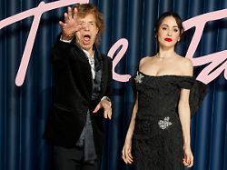 mick jagger and melanie hamrick attend the fashion awards 2025 at the royal albert hall in kensington london