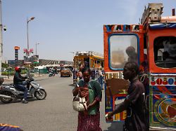 people walk in a street four days ahead of the presidential election in dakar senegal march 20 2024