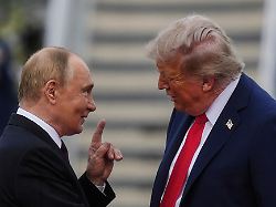 president donald trump greets russia s president vladimir putin on the tarmac at joint base elmendorf richardson in anchorage alaska aug 15 2025