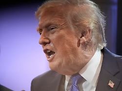 president donald trump right joined by solicitor general john sauer as trump speaks with reporters in the james brady press briefing room at the white house friday feb 20 2026 in washington