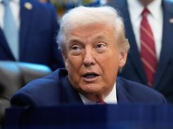 president donald trump speaks to reporters after signing a spending bill that ends a partial shutdown of the federal government in the oval office of the white house tuesday feb 3 2026 in washington