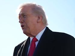 president donald trump speaks to reporters before boarding air force one at pope army airfield in fort bragg n c friday feb 13 2026 en route to palm beach fla