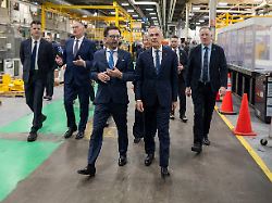 prime minister mark carney foreground right and cae inc president and ceo matthew bromberg tour company facilities in montreal on tuesday feb 17 2026