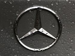 raindrops are seen on the logo of mercedes benz car in krakow poland on october 5 2016