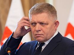 slovakia s prime minister robert fico adjusts his headphone during a joint news conference with u s secretary of state marco rubioin bratislava slovakia sunday feb 15 2026