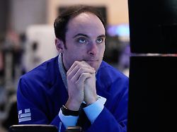 specialist joseph maguire works at his post on the floor of the new york stock exchange tuesday feb 3 2026