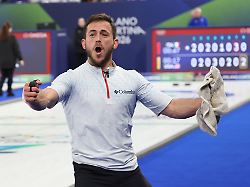 team usa s korey dropkin celebrates victory over italy in the curling mixed doubles semi finals at the 2026 winter olympics in cortina italy on monday february 09 2026 team usa beat italy 9 8