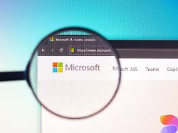 the microsoft logo is displayed through a magnifying glass in this photo illustration in ontario canada on february 5 2026