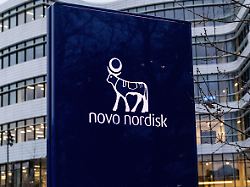 the logo of the pharmaceutical company novo nordisk is displayed in front of its offices in bagsvaerd on the outskirts of copenhagen denmark on december 23 2025