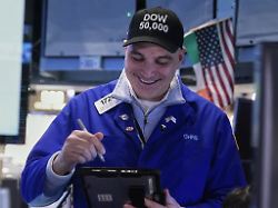 trader chris lagana works on the floor of the new york stock exchange friday feb 6 2026 as the dow jones industrial average closed above the 50 000 level for the first time